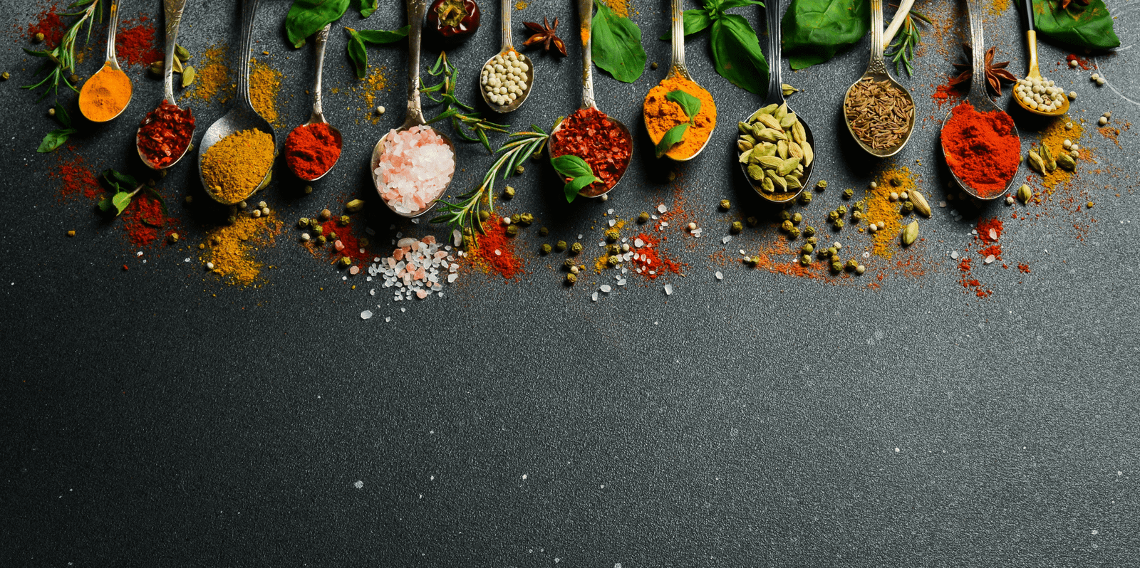 Colorful whole spices used in NaanUp cooking